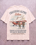 Tee lourd « Chasseurs Alpins » — écru — flatlay dos béton ciré